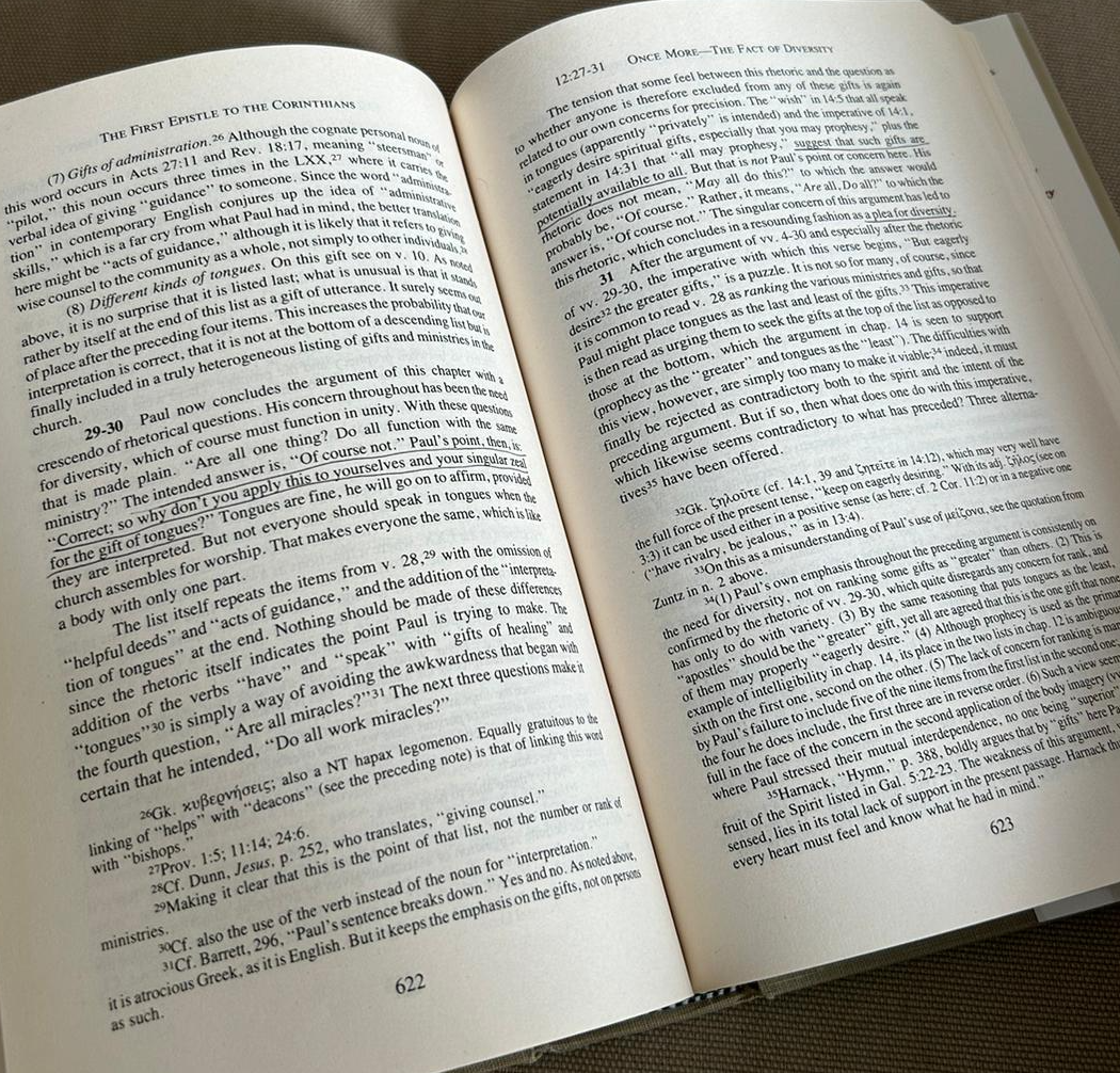 Open pages from Gordon D. Fee’s First Epistle to the Corinthians commentary.