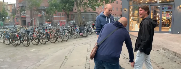 Prayer for a young man’s knee on a city street