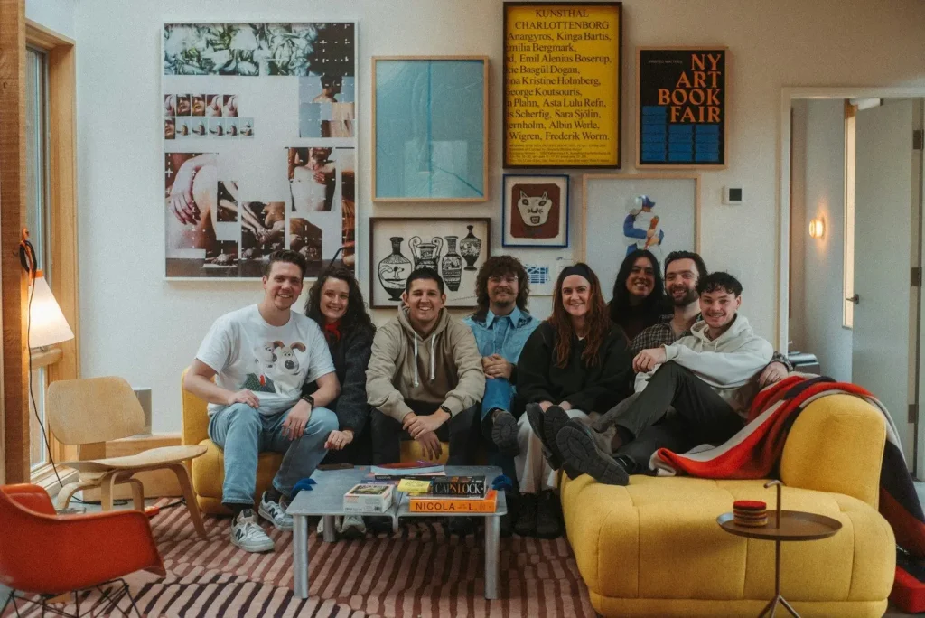 A group of people sitting together in community.