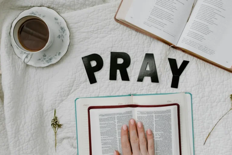 bible coffee and the letters "PRAY"