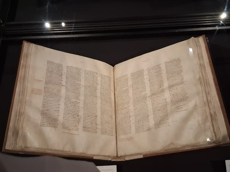 Pages of the ancient Greek Codex Sinaiticus manuscript in a display case at the British Library